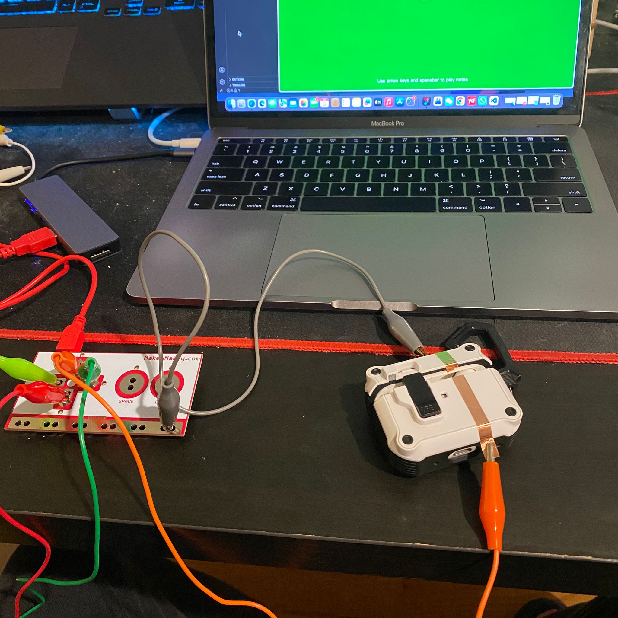 I managed to create a simple switch using the earphone case.