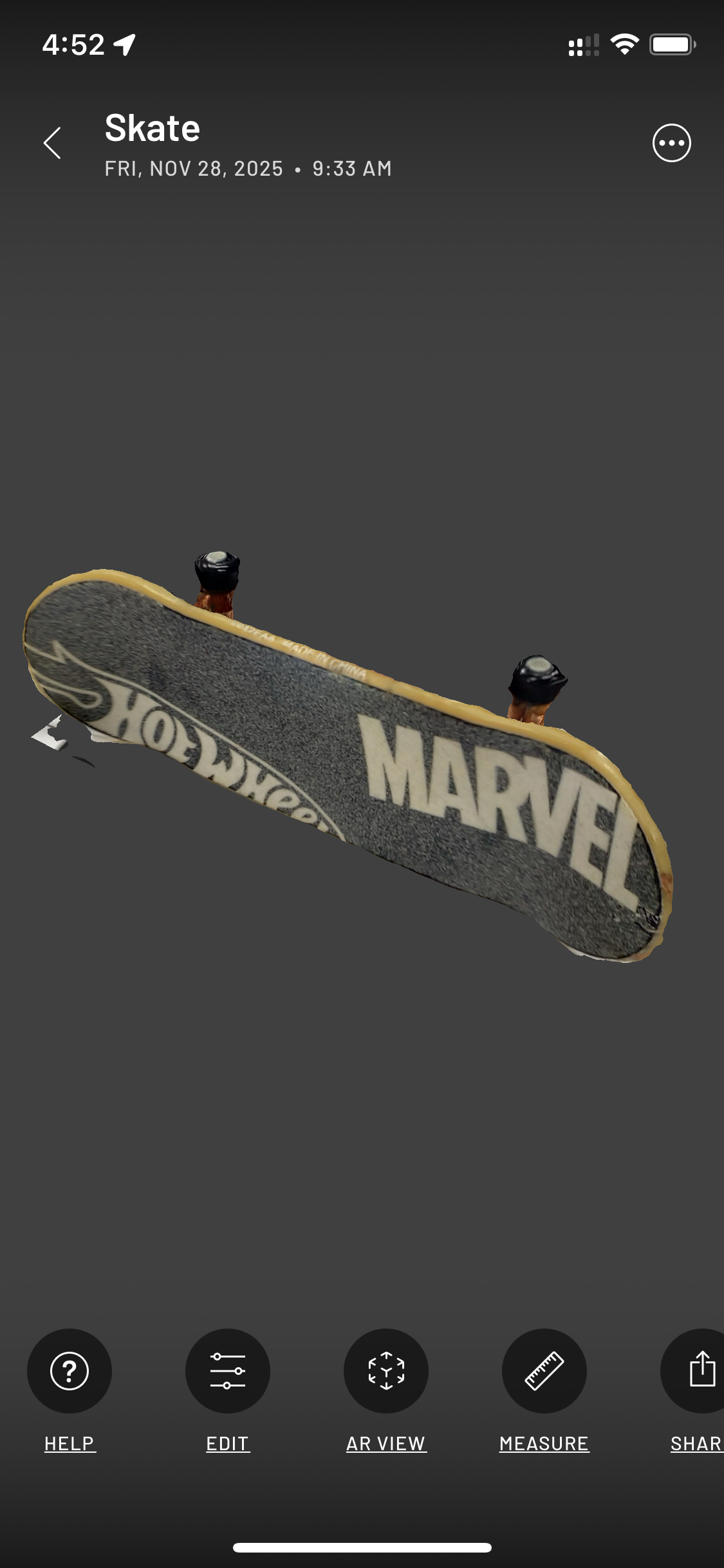 Scanned toy skateboard back view