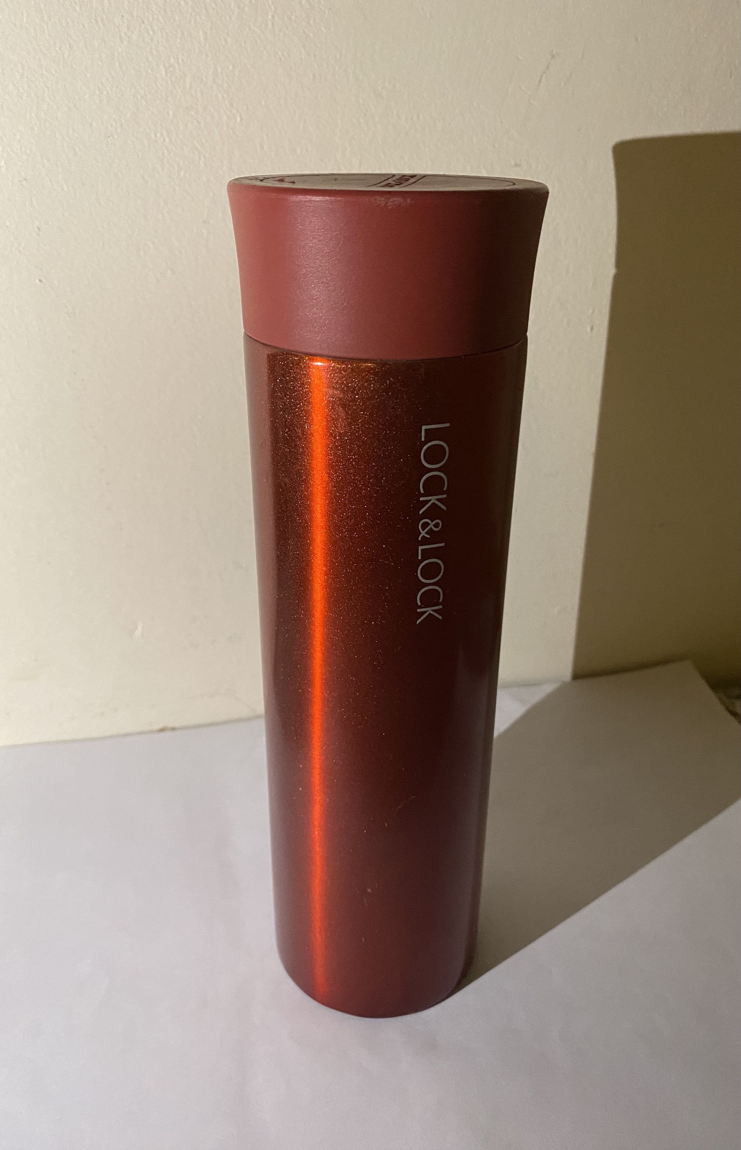 The left side picture of the water bottle